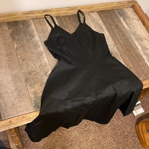Adorable all black zip in the back cocktail dress